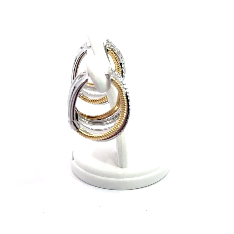 Interlocking Diamond rings with yellow gold earrings